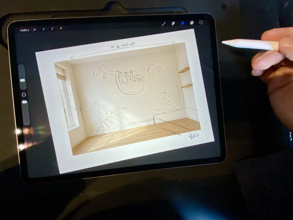 Workspace creating vinyl mural design on ipad